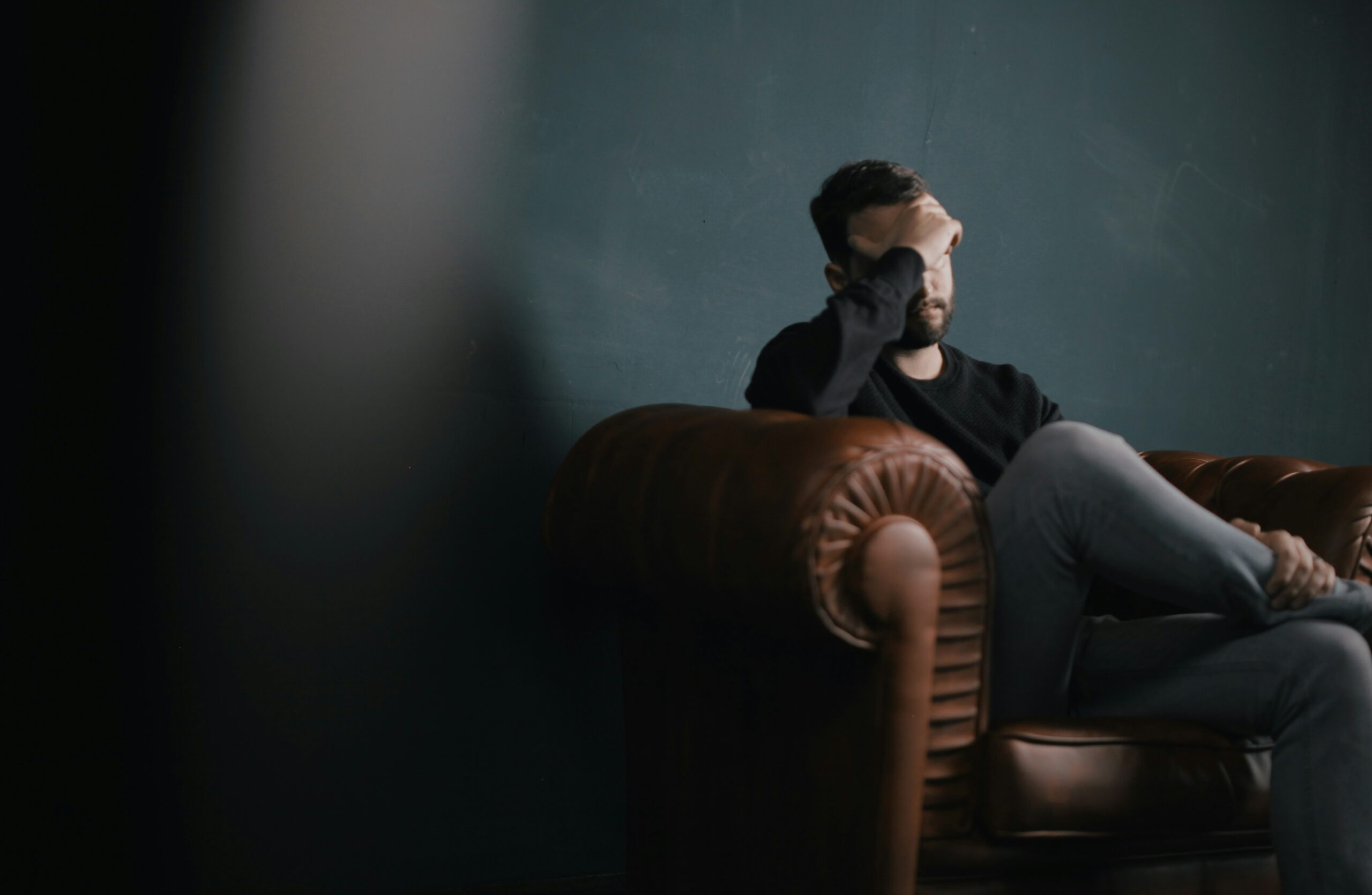 a man sitting in the couch